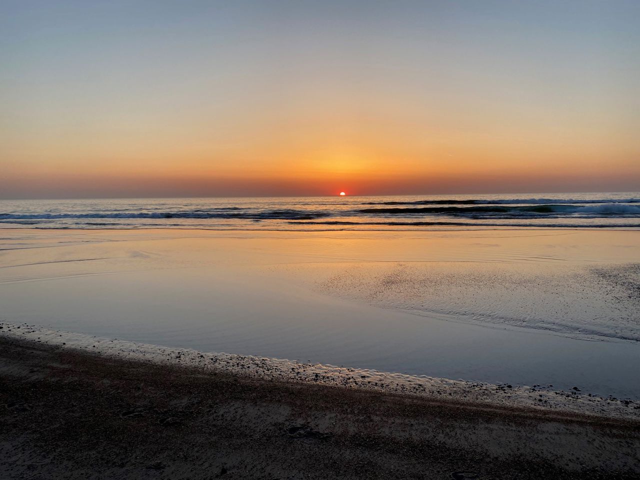solnedgang over strand