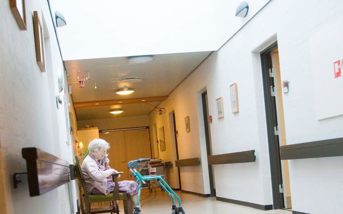 Ældre dame med rollator